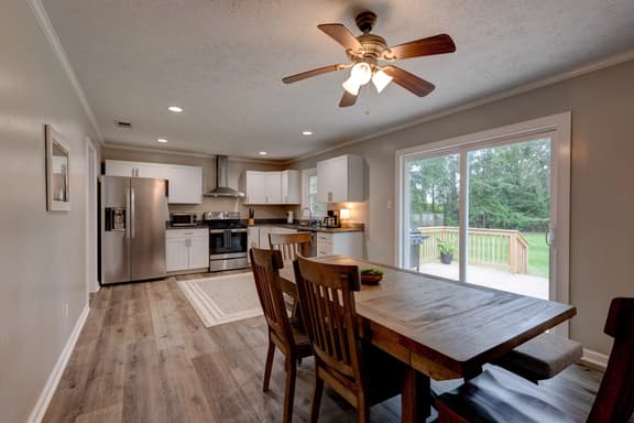 Spacious 4BR/3BA Home with Large Fenced yard - Image 1